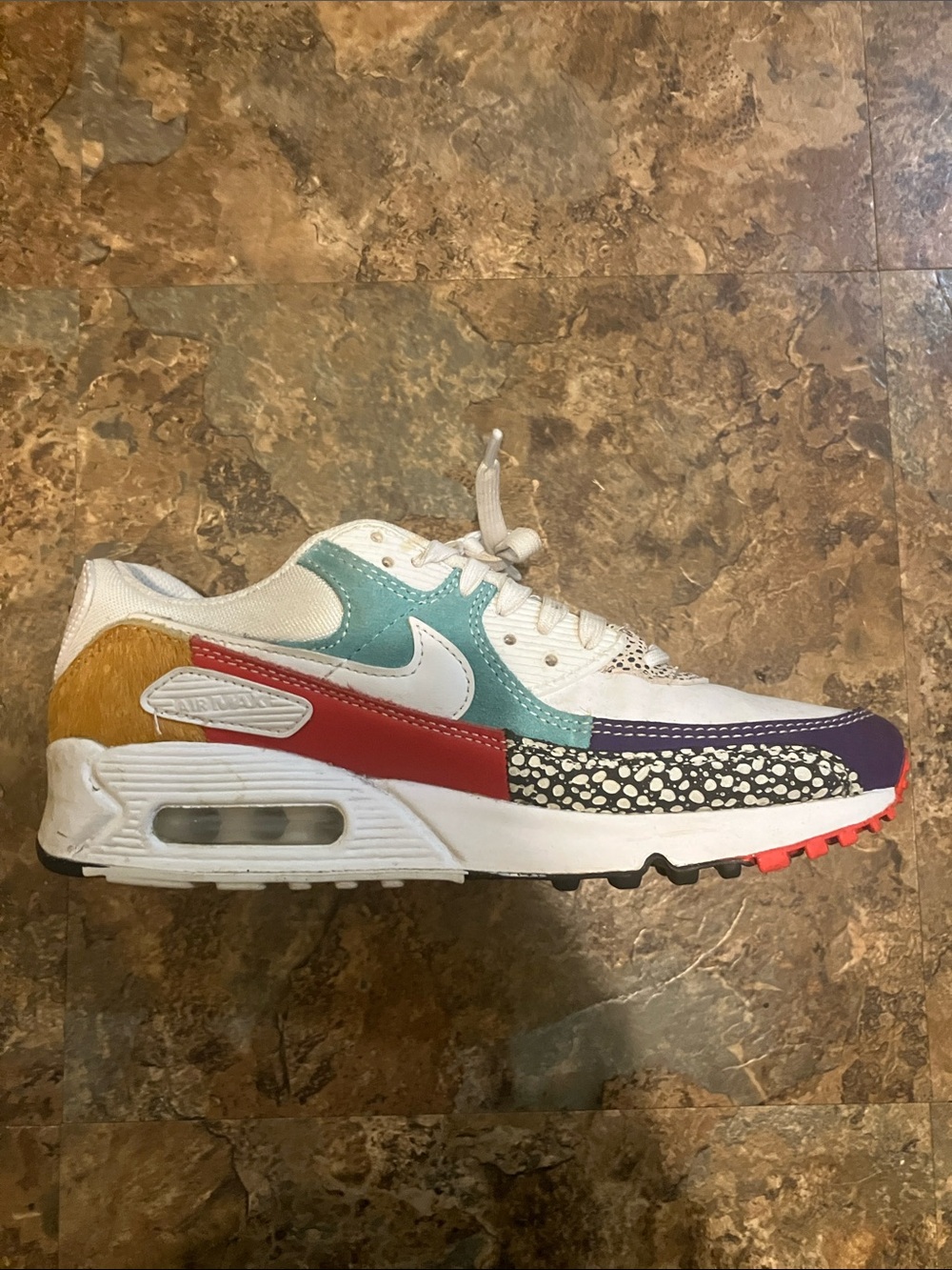 Nike White Sneaker with Teal, Red, Purple & Mustard Accents